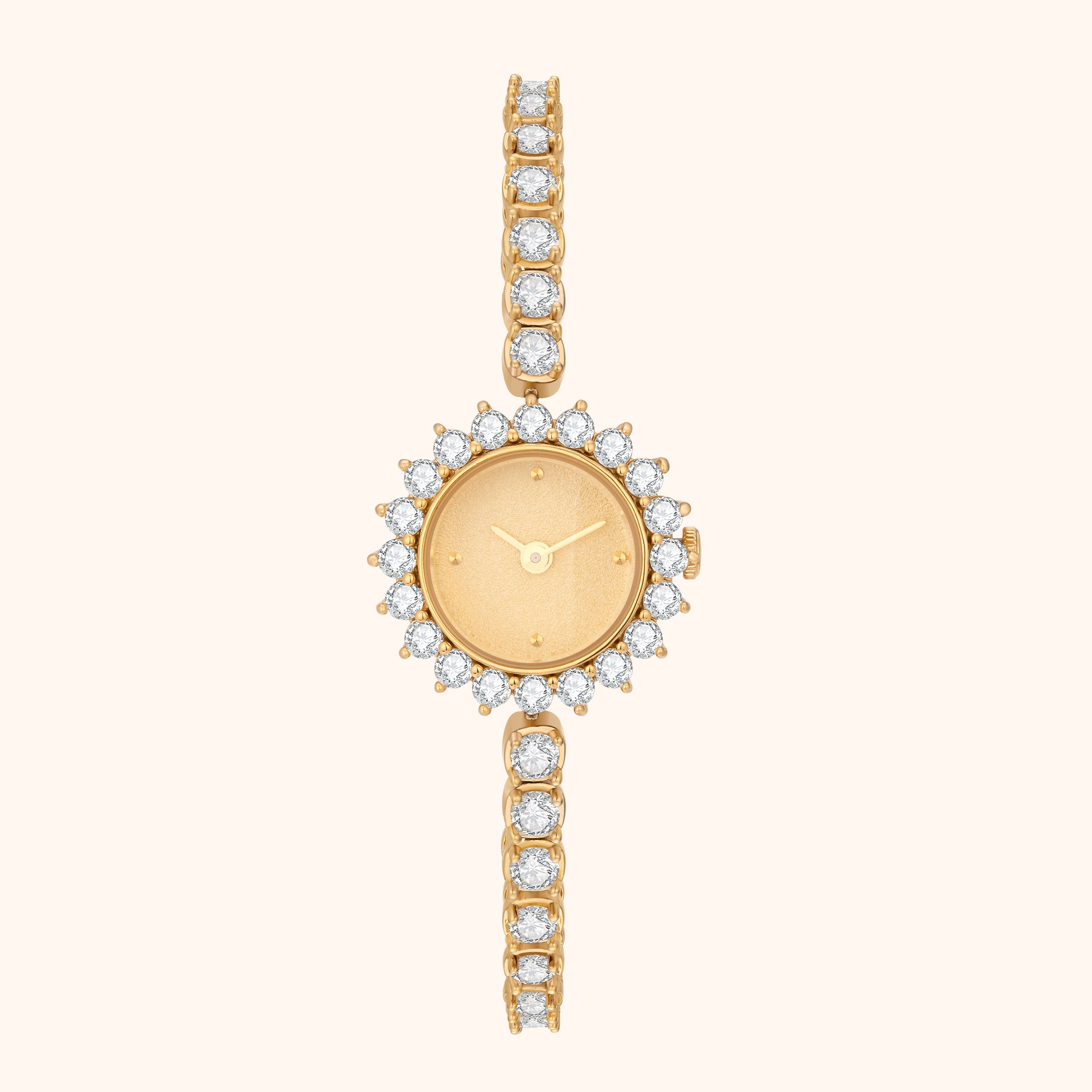 Gold vintage inspired watch with diamond accents on a white background