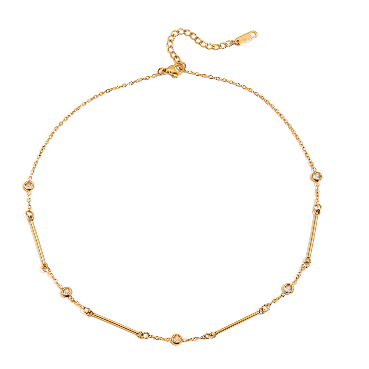 Gold necklace with small diamonds on a white background