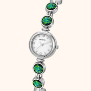 Montre pour femme OhKlassy Calypso Silver d'inspiration vintage, vue de profil en angle